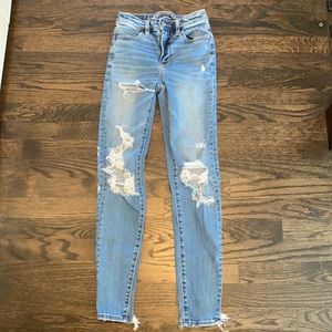 Women’s distressed jeans.